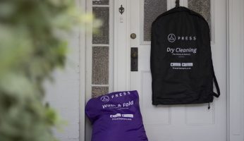 Press laundry and dry cleaning bag on doorstep